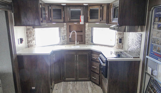 To learn more about travel trailers, view the spacious interior of a Keystone Bullet
